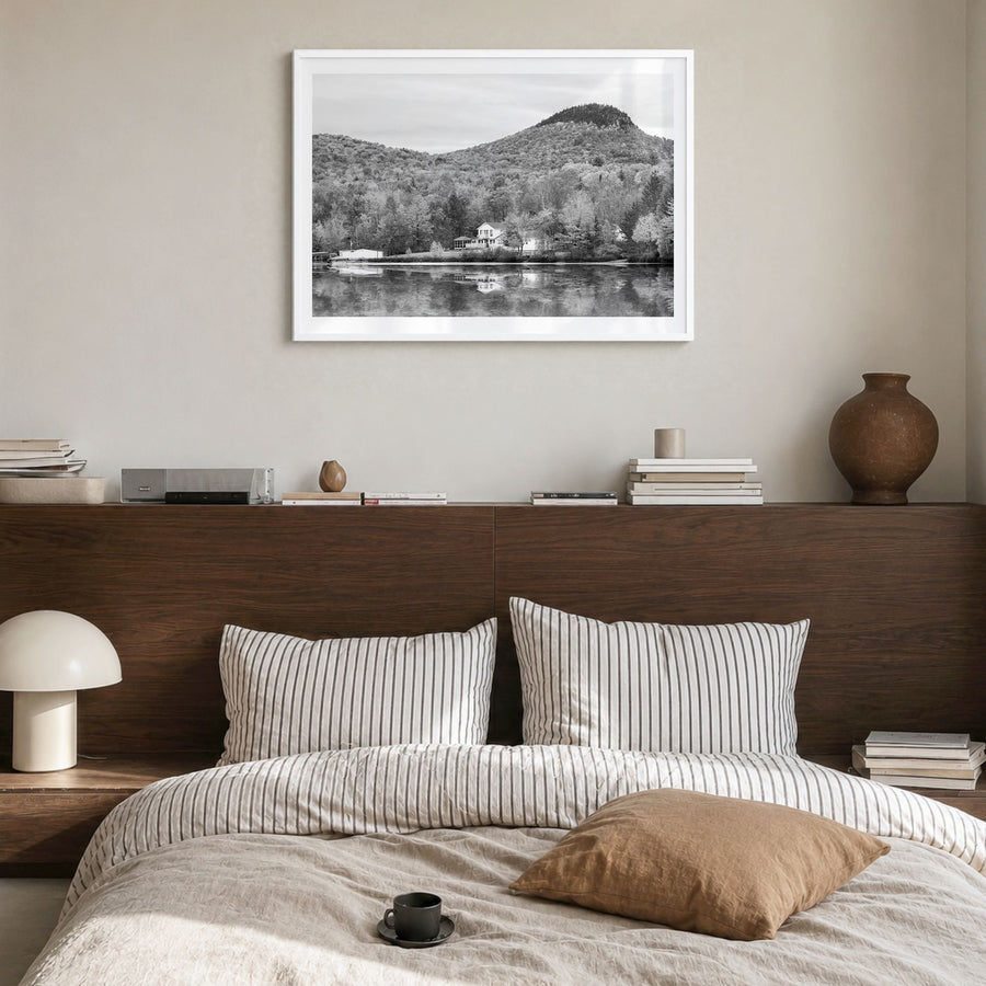 Vermont Photo Poster in a white wood frame, hanging in a bedroom, white border