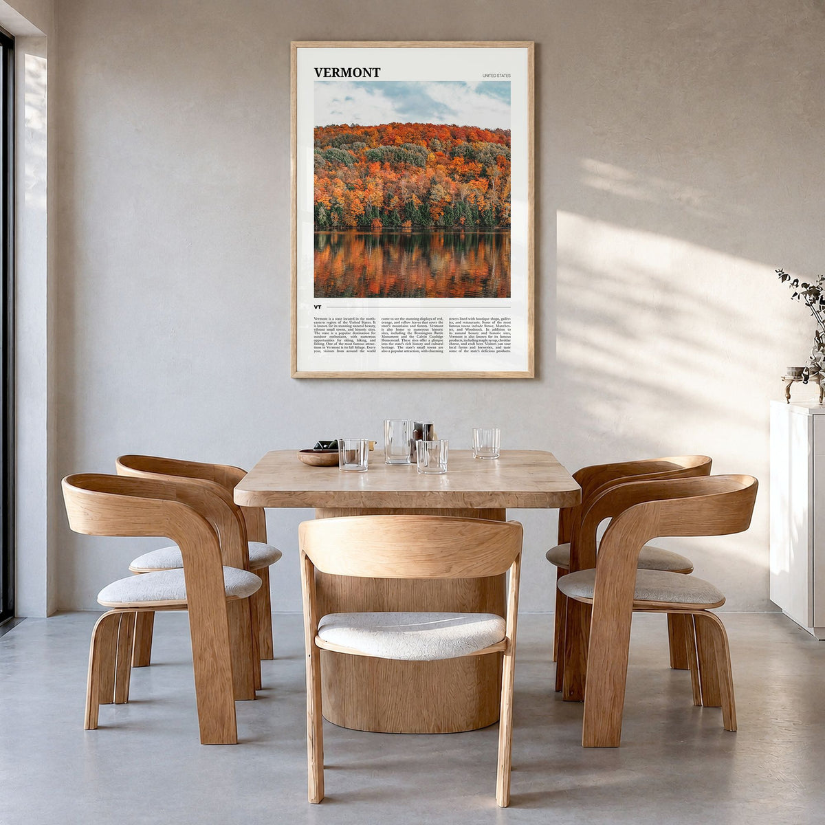 Vermont Travel No 3 Poster in a natural wood frame, hanging in a dining room