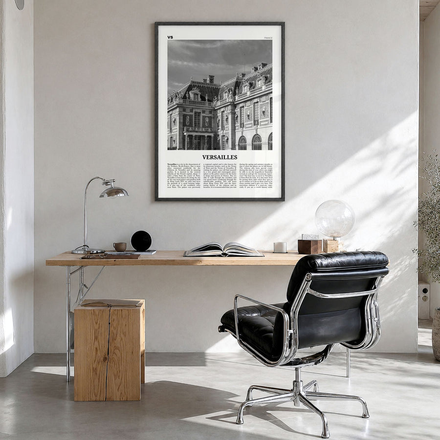 Versailles Newspaper Poster in a black wood frame, hanging in a bright home office