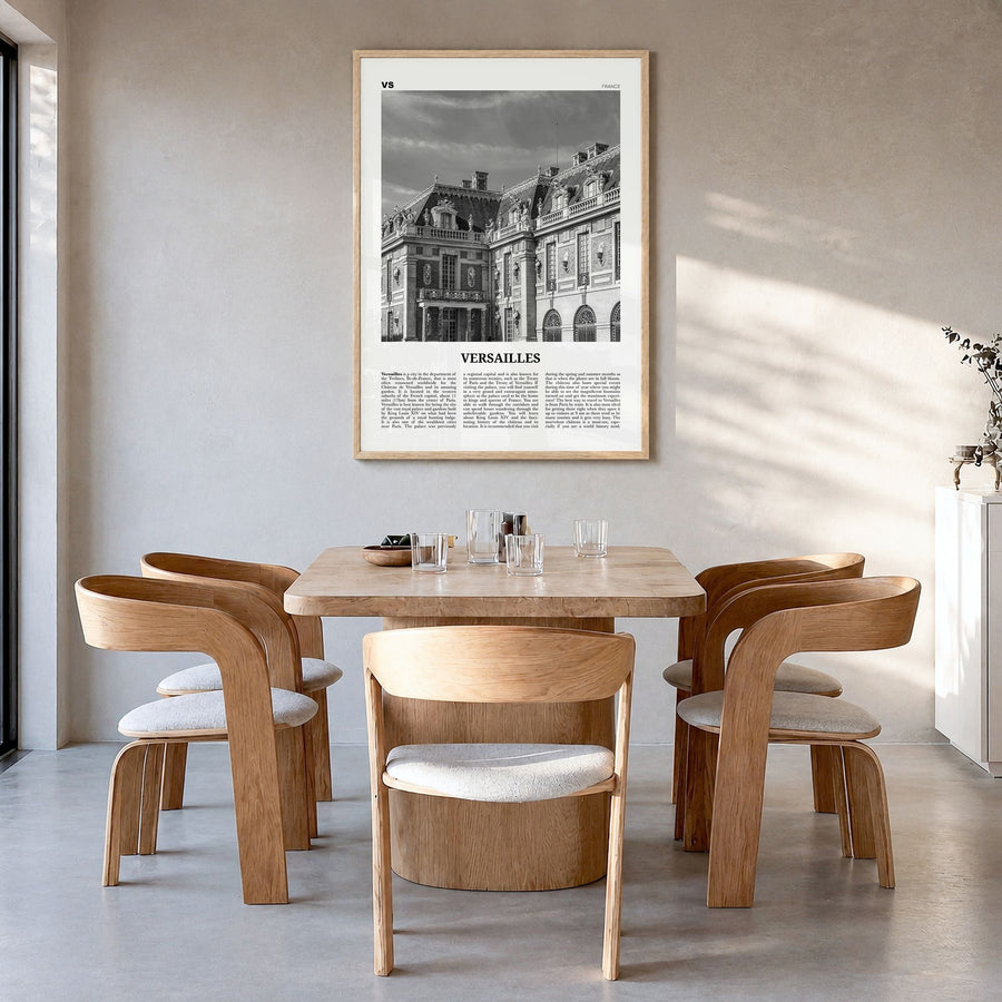 Versailles Newspaper Poster in a natural wood frame, hanging in a dining room