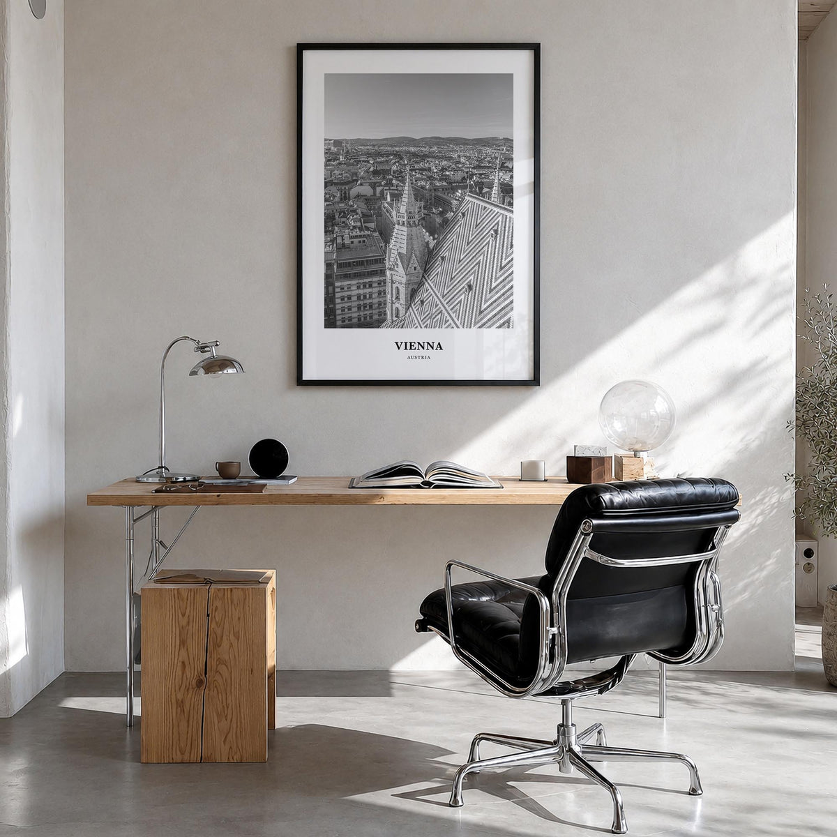 Vienna no. 2 black & white classic poster of Austria – vertical wall art in black wood frame, hanging on wall