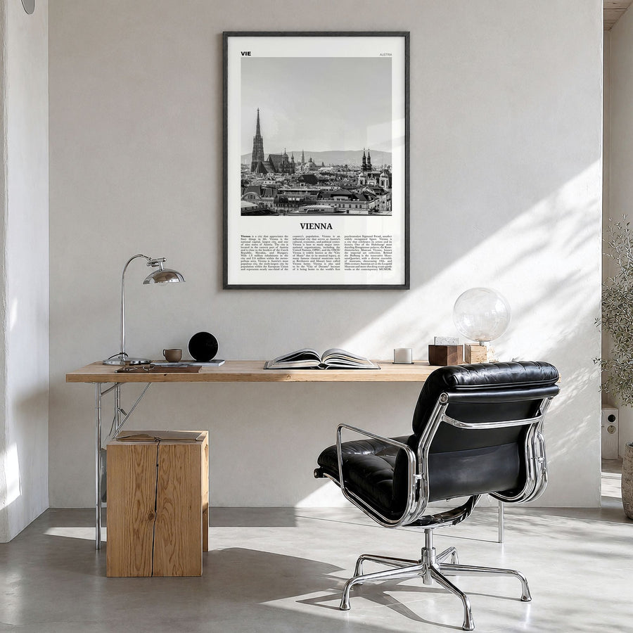 Vienna Newspaper No 1 Poster in a black wood frame, hanging in a bright home office