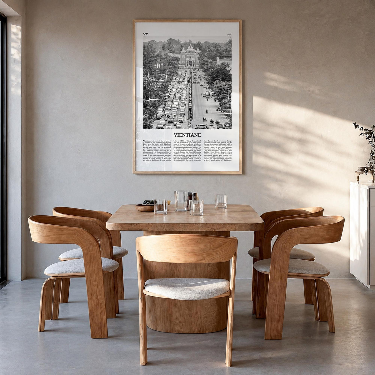 Vientiane black & white newspaper poster of Laos – vertical wall art in natural wood frame, hanging on wall
