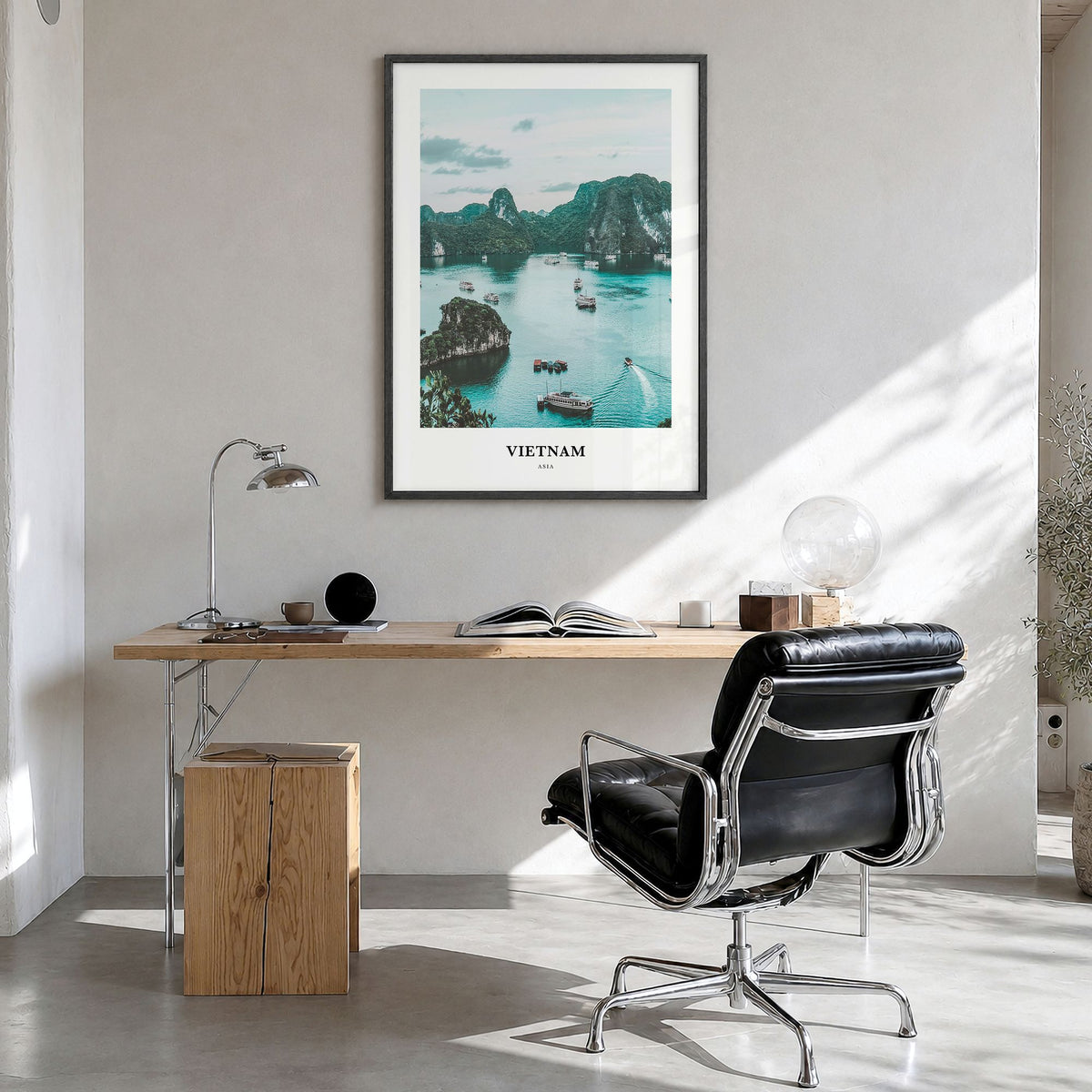 Vietnam Classic Poster in a black wood frame, hanging in a bright home office