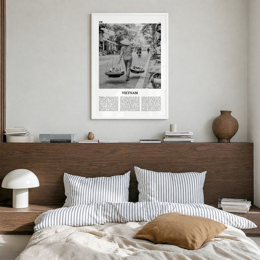 Vietnam Newspaper No 2 Poster in a white wood frame, hanging in a bedroom