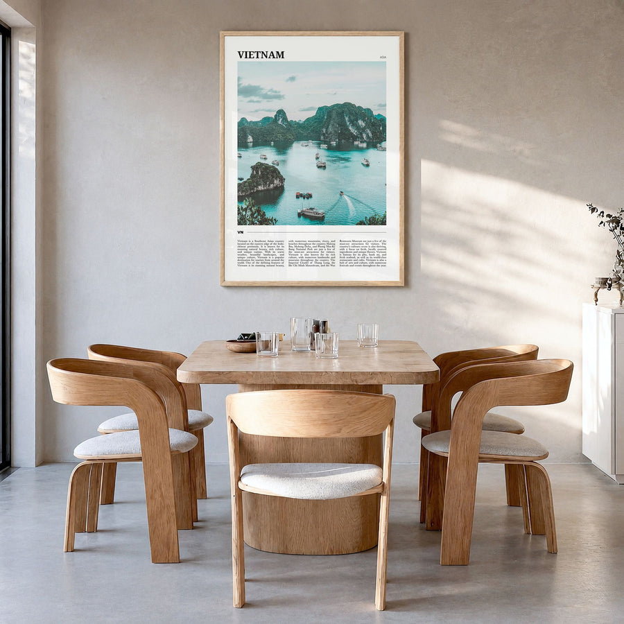 Vietnam Travel Poster in a natural wood frame, hanging in a dining room