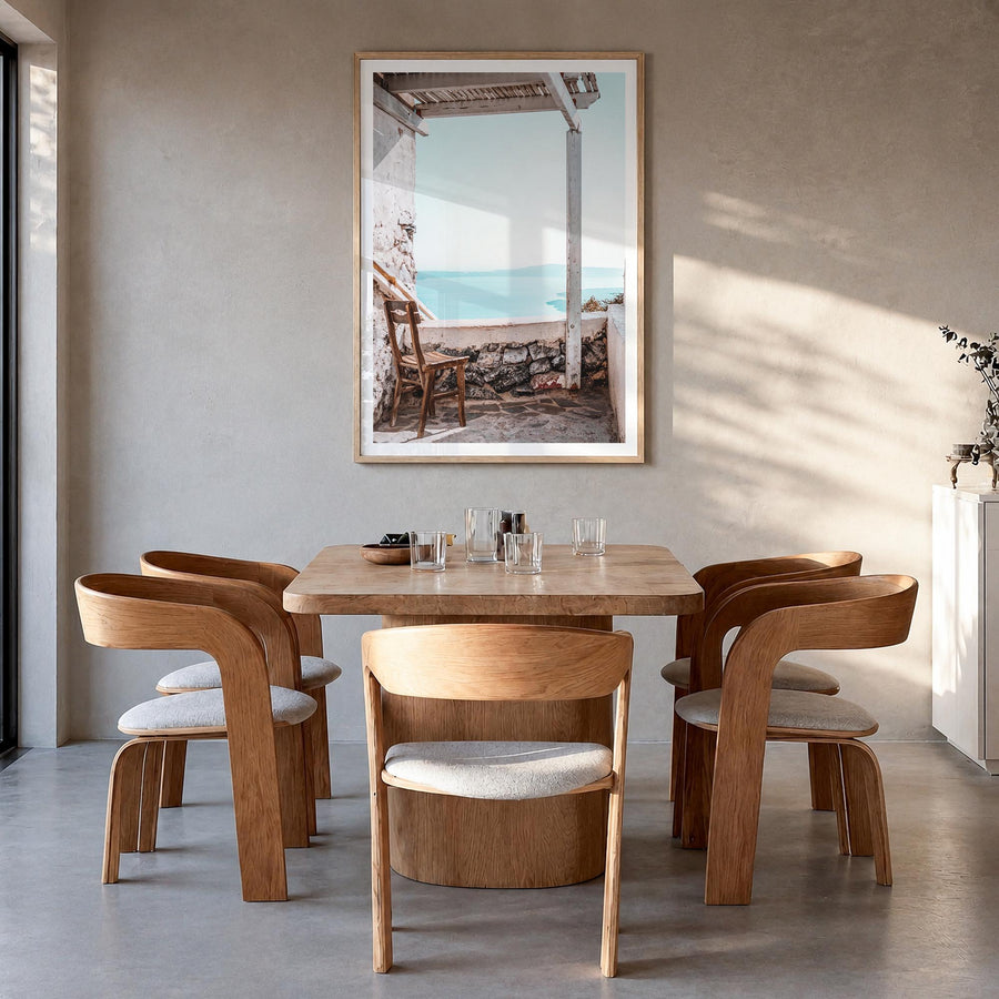 View from a Chair colorful photo poster – vertical wall art in natural wood frame with white border, hanging on wall