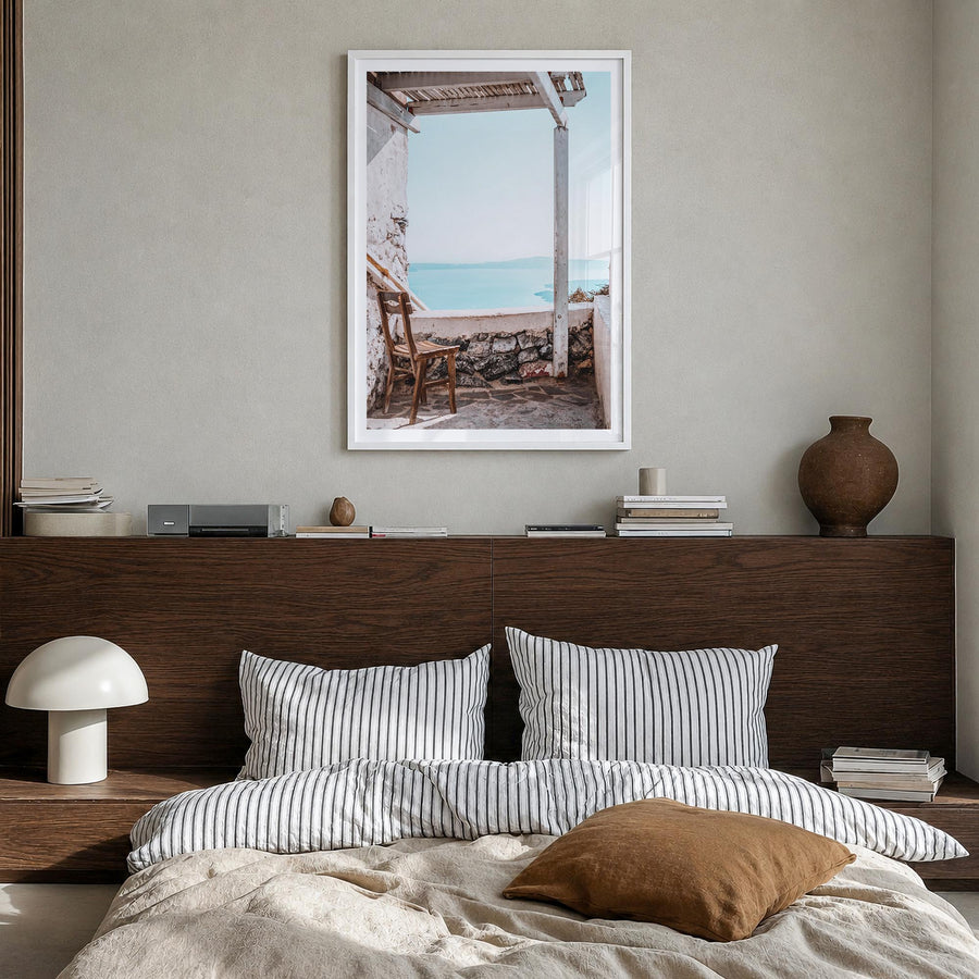 View from a Chair colorful photo poster – vertical wall art in white wood frame with white border, hanging on wall