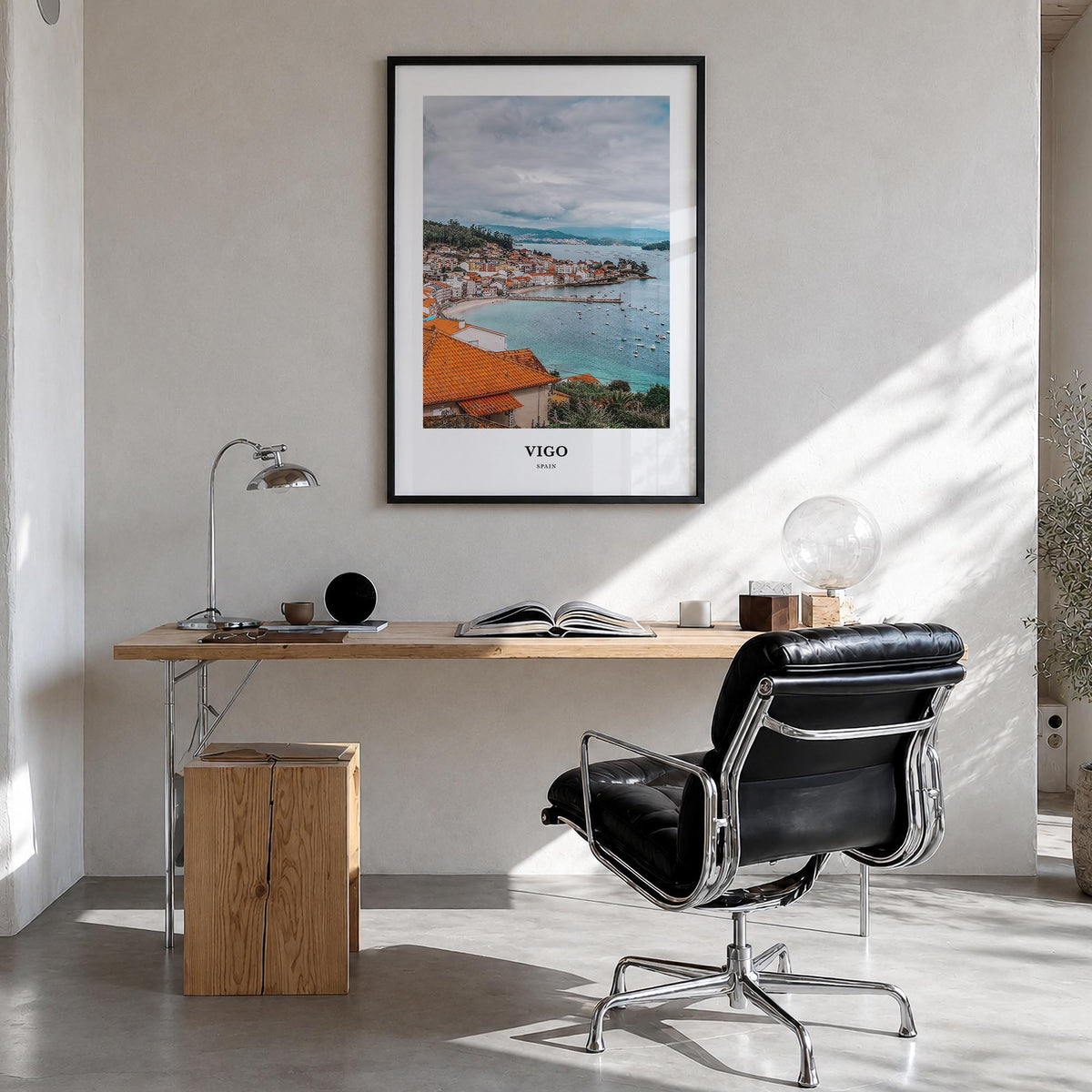 Vigo colorful classic poster of Spain – vertical wall art in black wood frame, hanging on wall