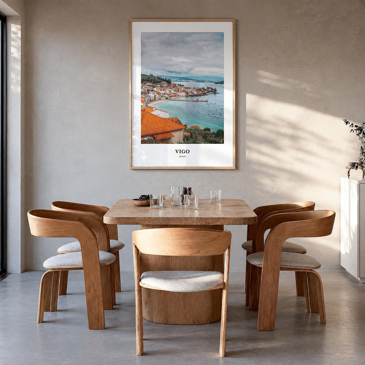 Vigo colorful classic poster of Spain – vertical wall art in natural wood frame, hanging on wall