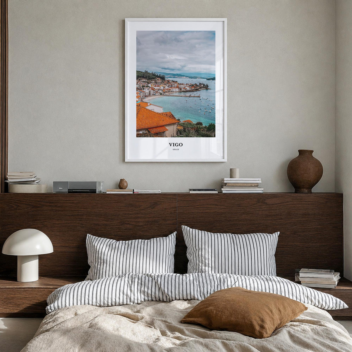 Vigo colorful classic poster of Spain – vertical wall art in white wood frame, hanging on wall