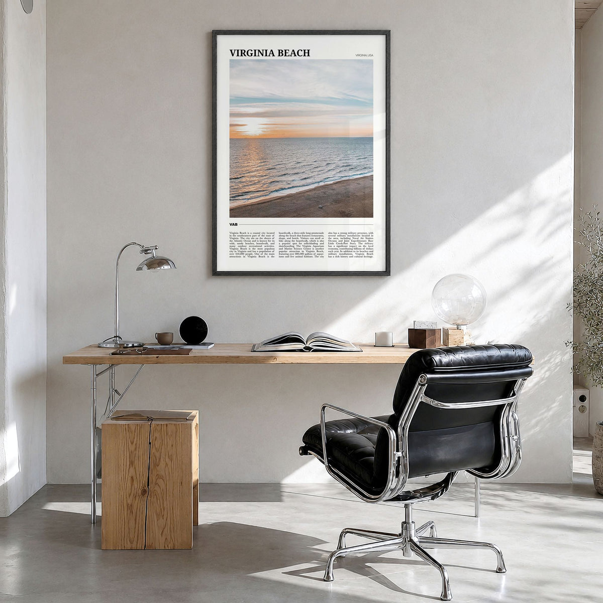 Virginia Beach Travel Poster in a black wood frame, hanging in a bright home office