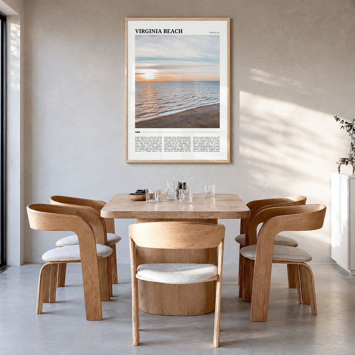 Virginia Beach Travel Poster in a natural wood frame, hanging in a dining room