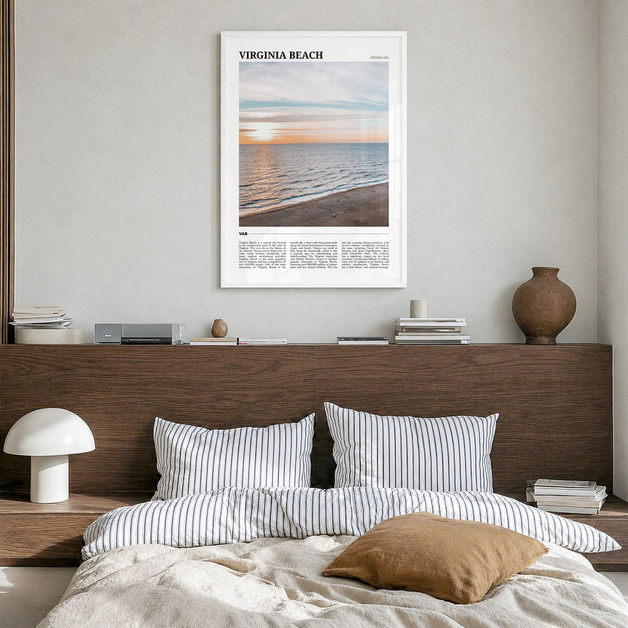 Virginia Beach Travel Poster in a white wood frame, hanging in a bedroom