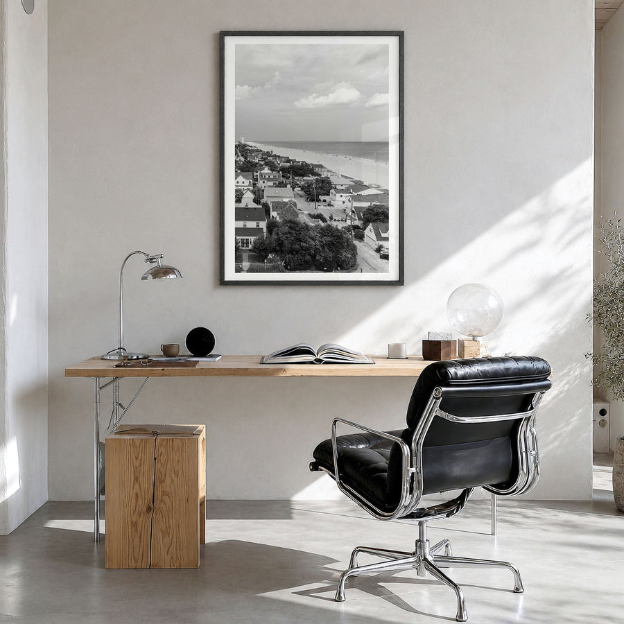 Virginia Photo Poster in a black wood frame, hanging in a bright home office, white border
