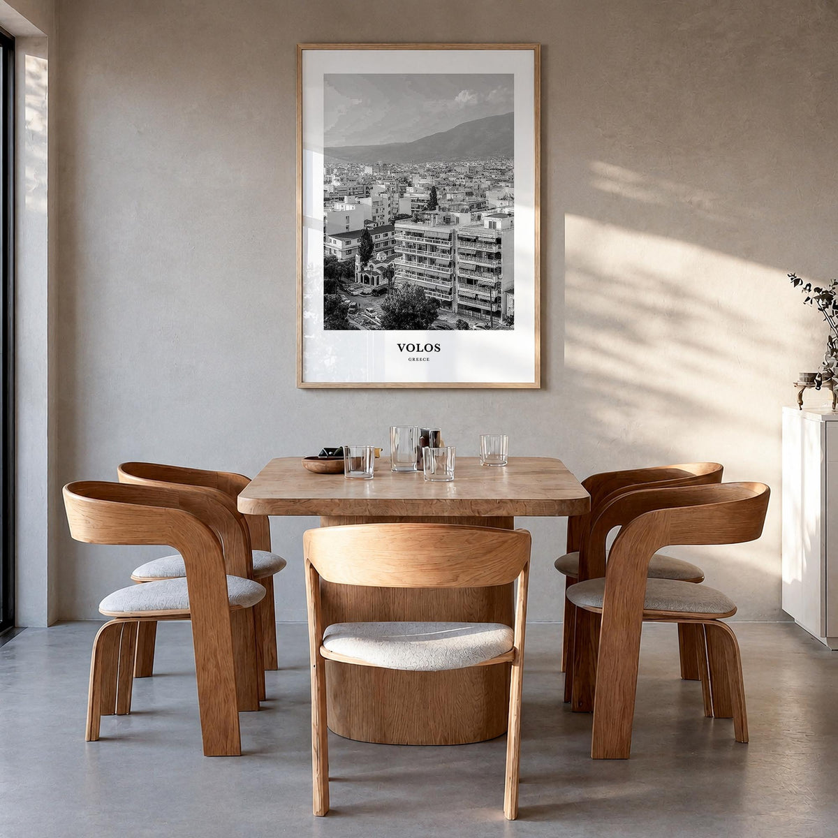 Volos black & white classic poster of Greece – vertical wall art in natural wood frame, hanging on wall