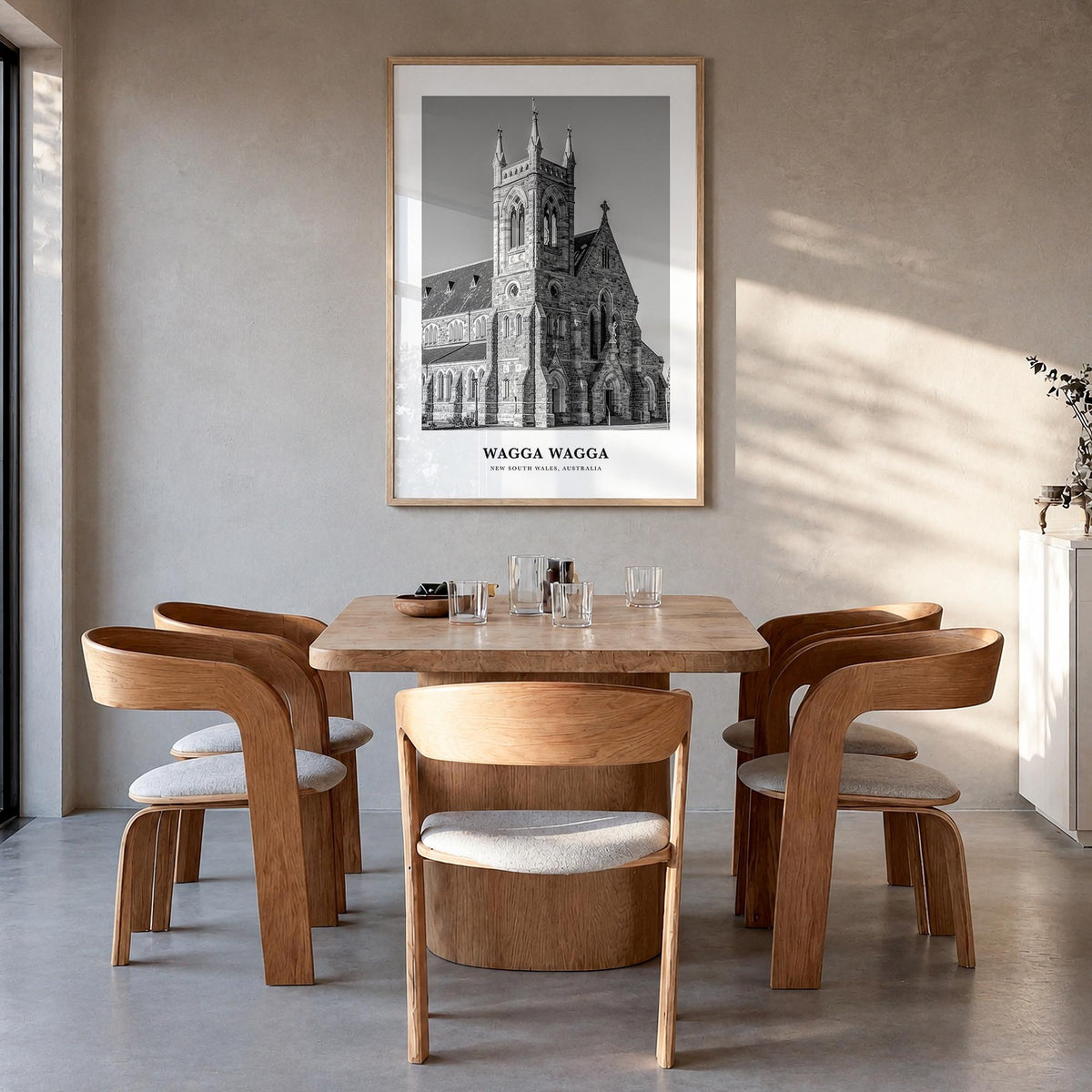 Wagga Wagga black & white classic poster of Australia – vertical wall art in natural wood frame, hanging on wall