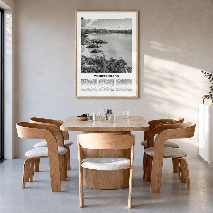 Waiheke Island Newspaper Poster in a natural wood frame, hanging in a dining room