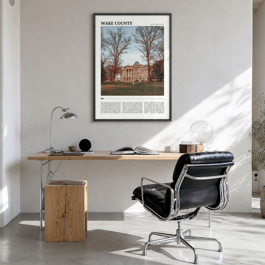 Wake County Travel Poster in a black wood frame, hanging in a bright home office