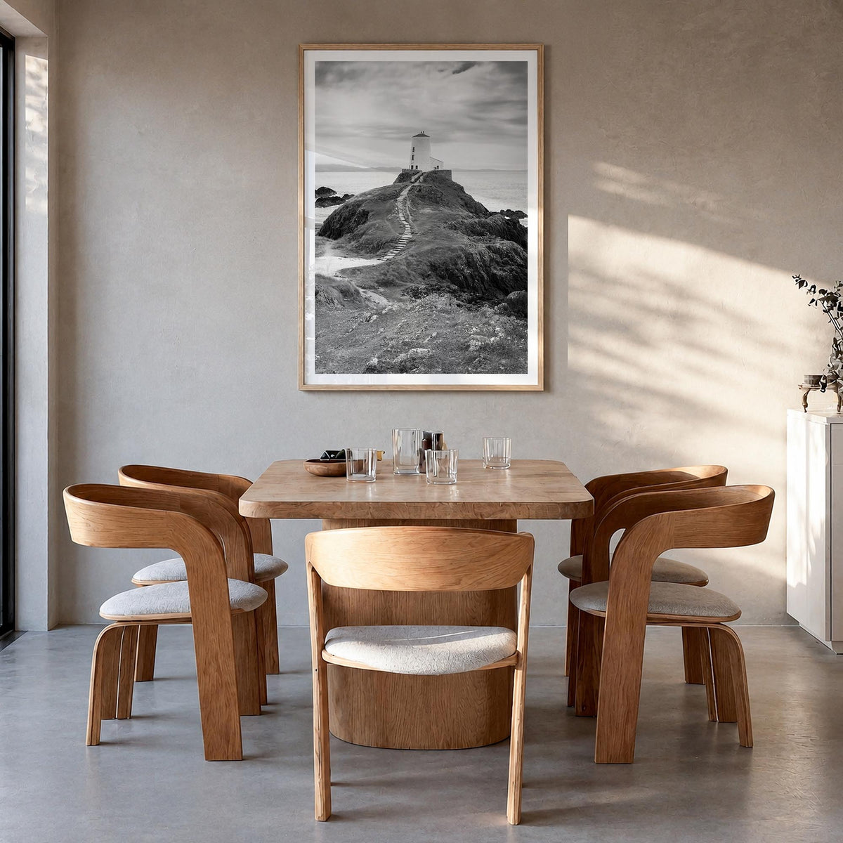 Wales black & white photo poster of United Kingdom – vertical wall art in natural wood frame with white border, hanging on wa