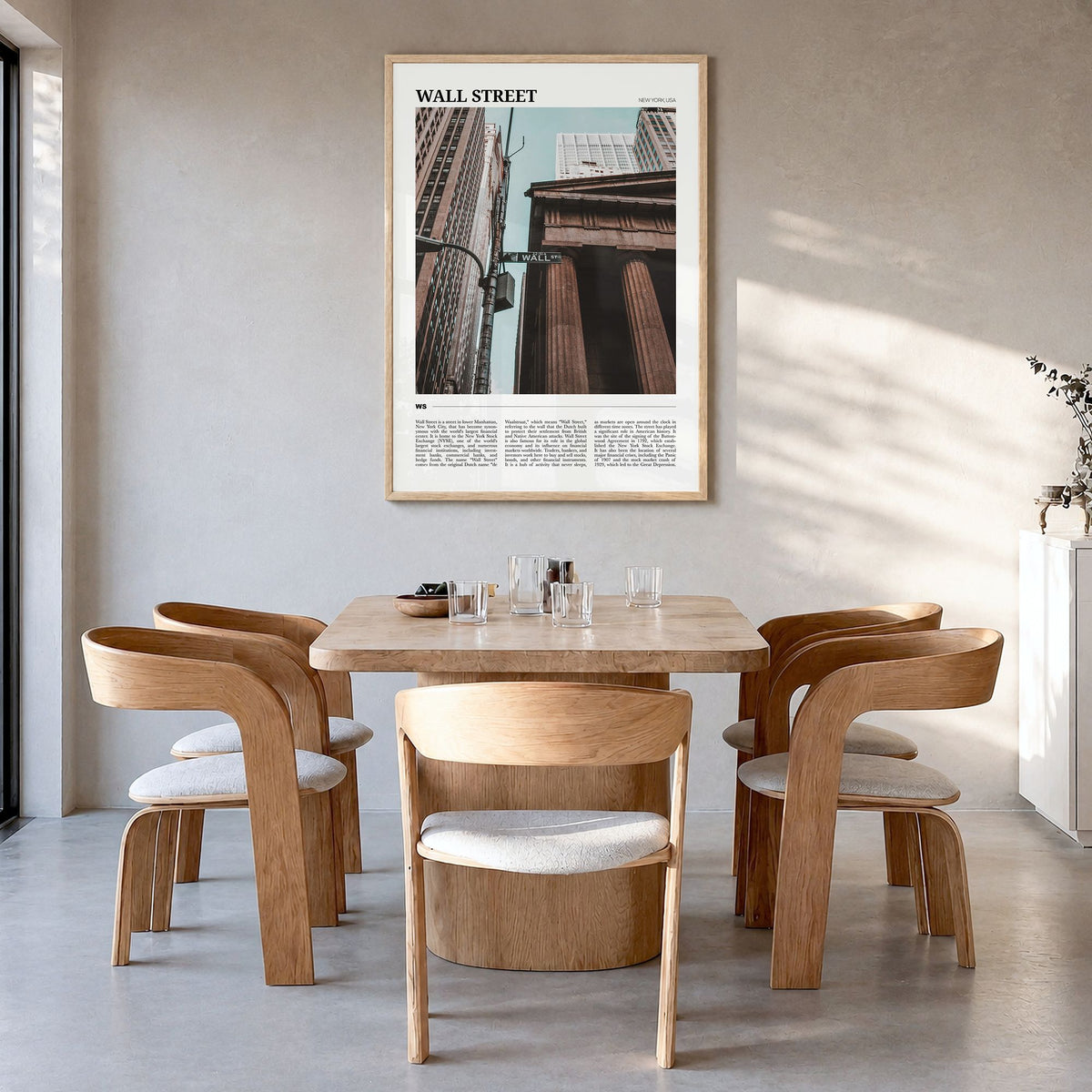 Wall Street Travel Poster in a natural wood frame, hanging in a dining room