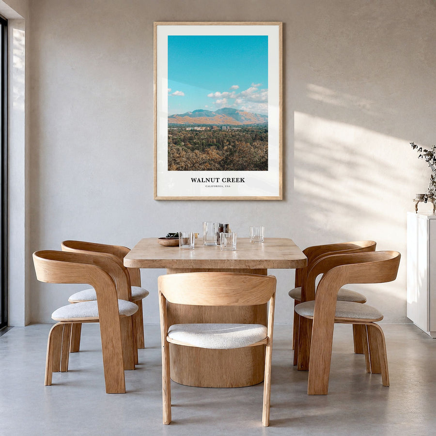 Walnut Creek Classic Poster in a natural wood frame, hanging in a dining room