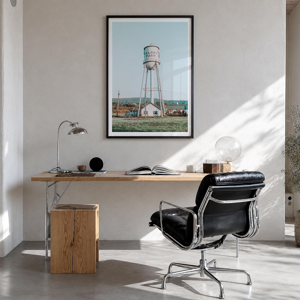 Water Tower no. 1 colorful photo poster – vertical wall art in black wood frame with white border, hanging on wall