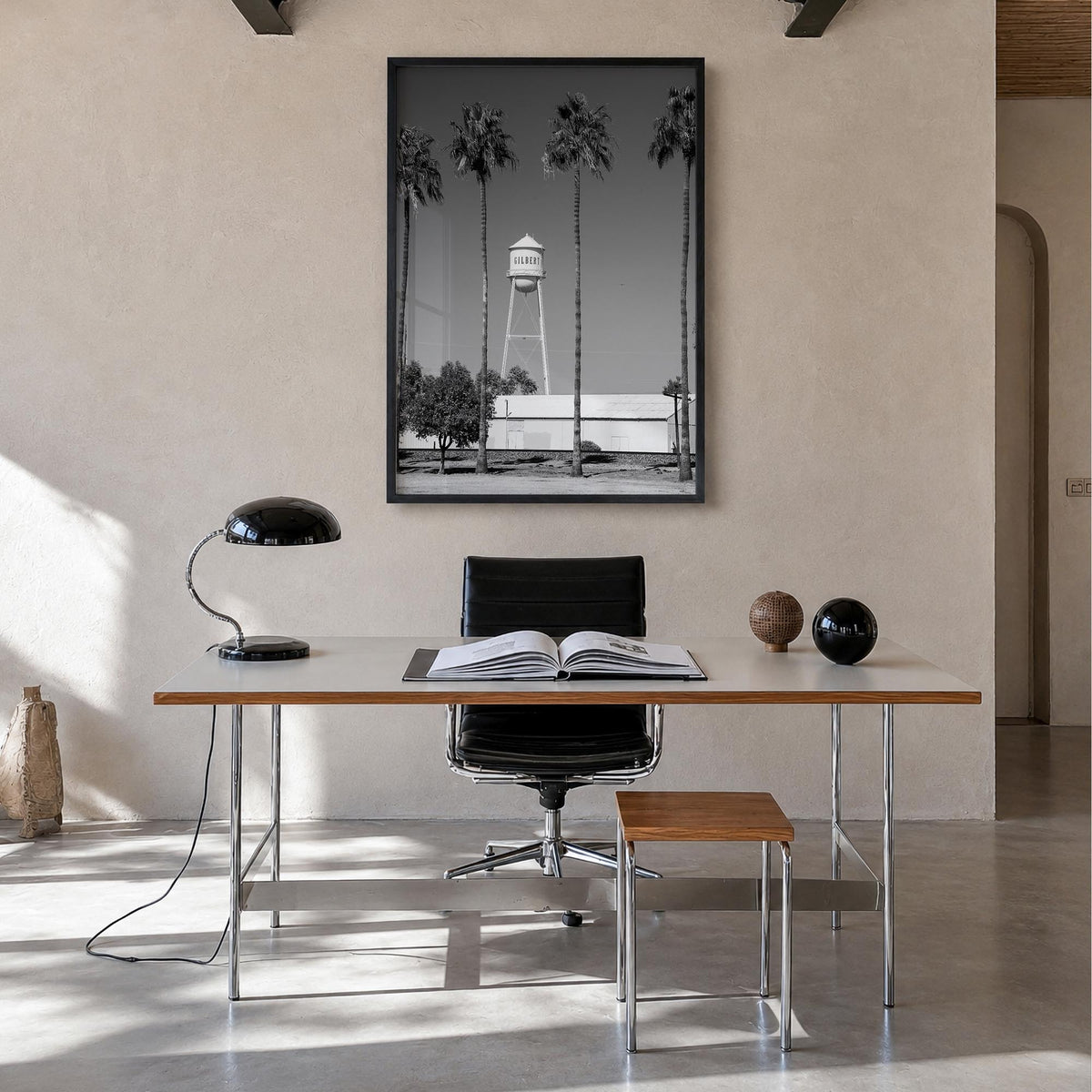Water Tower no. 2 black & white photo poster – vertical wall art in black wood frame, hanging on wall