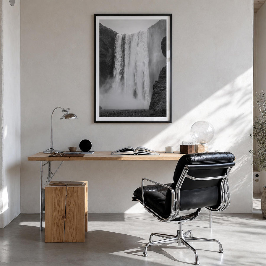 Waterfall no. 1 black & white photo poster – vertical wall art in black wood frame with white border, hanging on wall