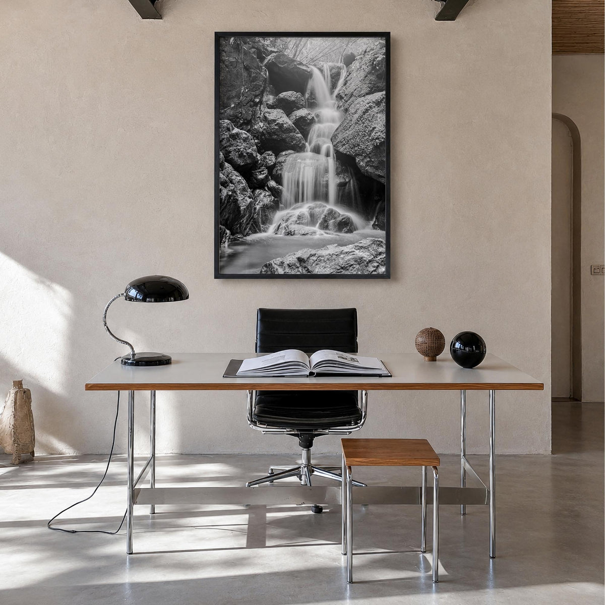 Waterfall no. 2 black & white photo poster – vertical wall art in black wood frame, hanging on wall