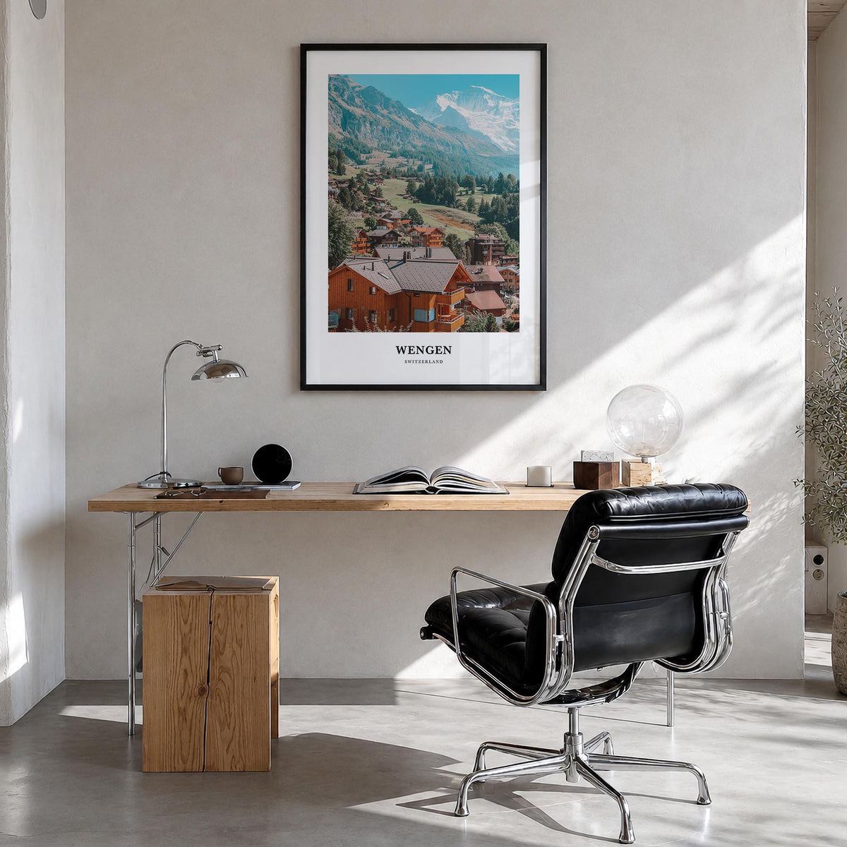 Wengen colorful classic poster of Switzerland – vertical wall art in black wood frame, hanging on wall