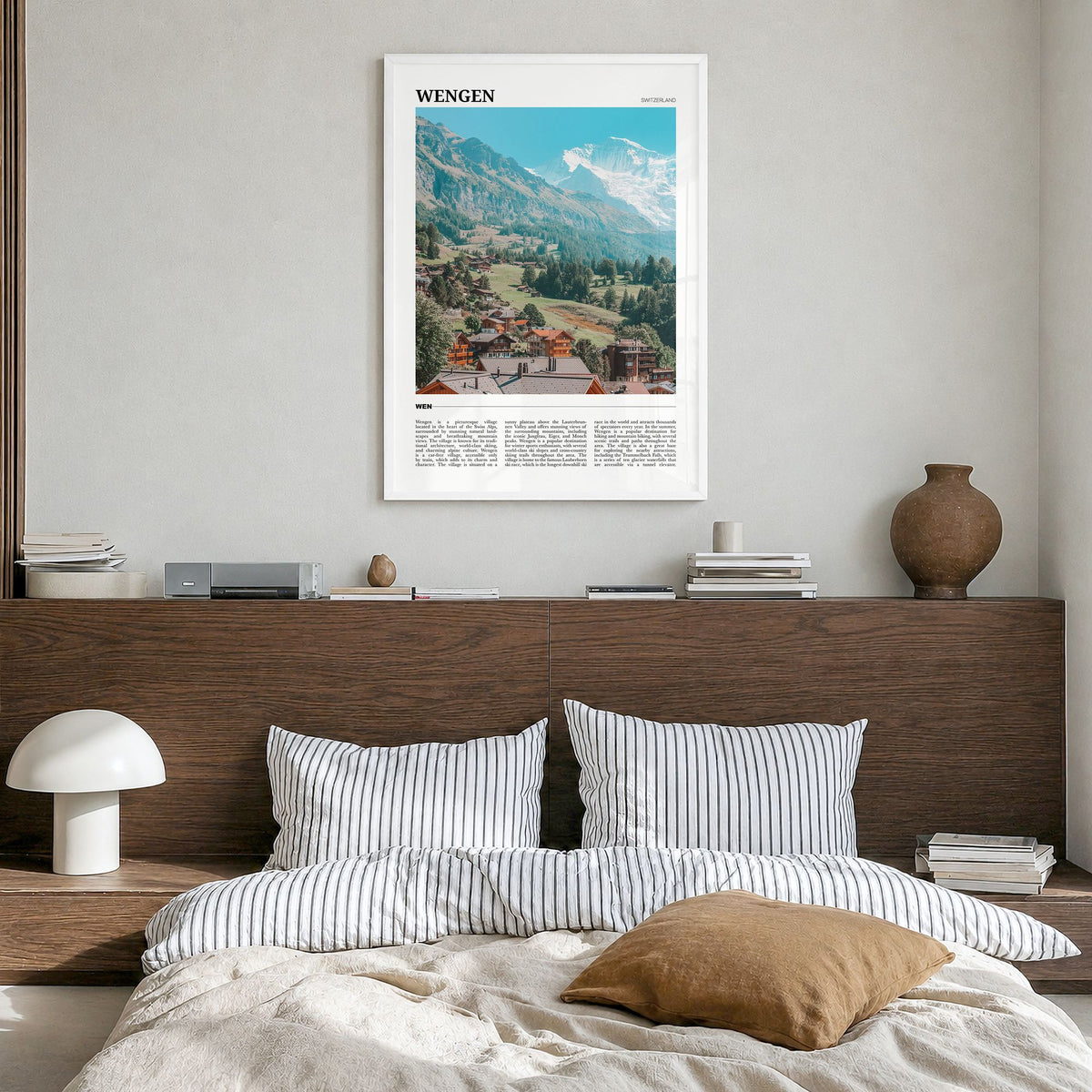 Wengen Travel Poster in a white wood frame, hanging in a bedroom