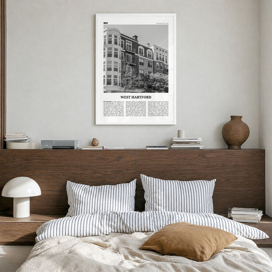 West Hartford Newspaper Poster in a white wood frame, hanging in a bedroom
