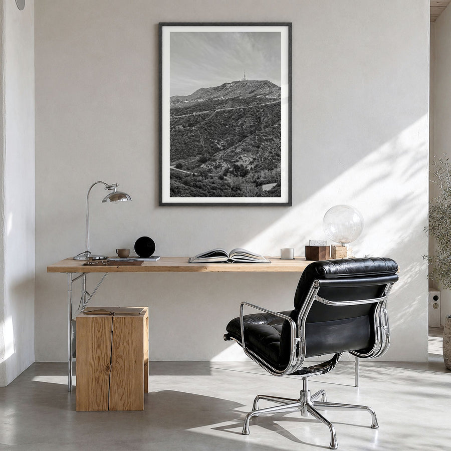 West Hollywood Photo Poster in a black wood frame, hanging in a bright home office, white border