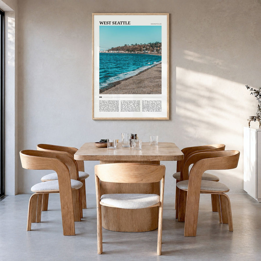 West Seattle Travel Poster in a natural wood frame, hanging in a dining room