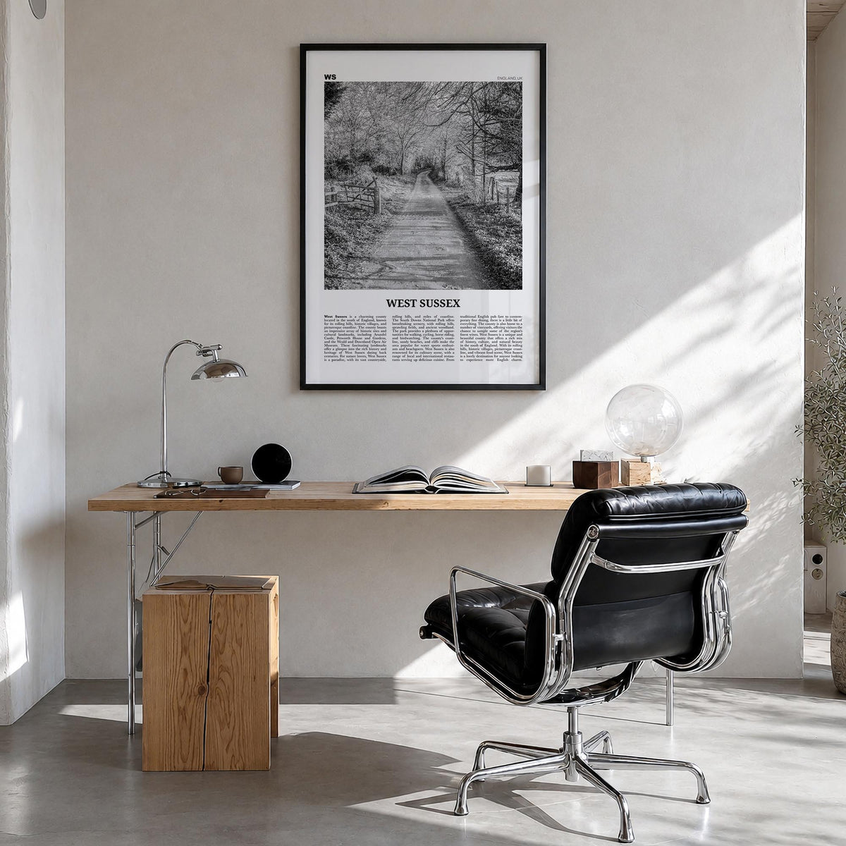 West Sussex black & white newspaper poster of United Kingdom – vertical wall art in black wood frame, hanging on wall
