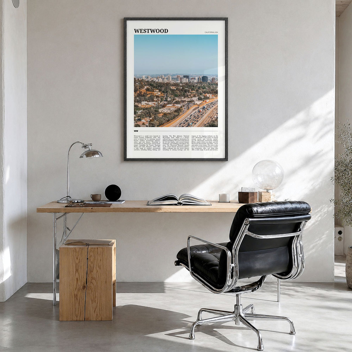 Westwood Travel Poster in a black wood frame, hanging in a bright home office