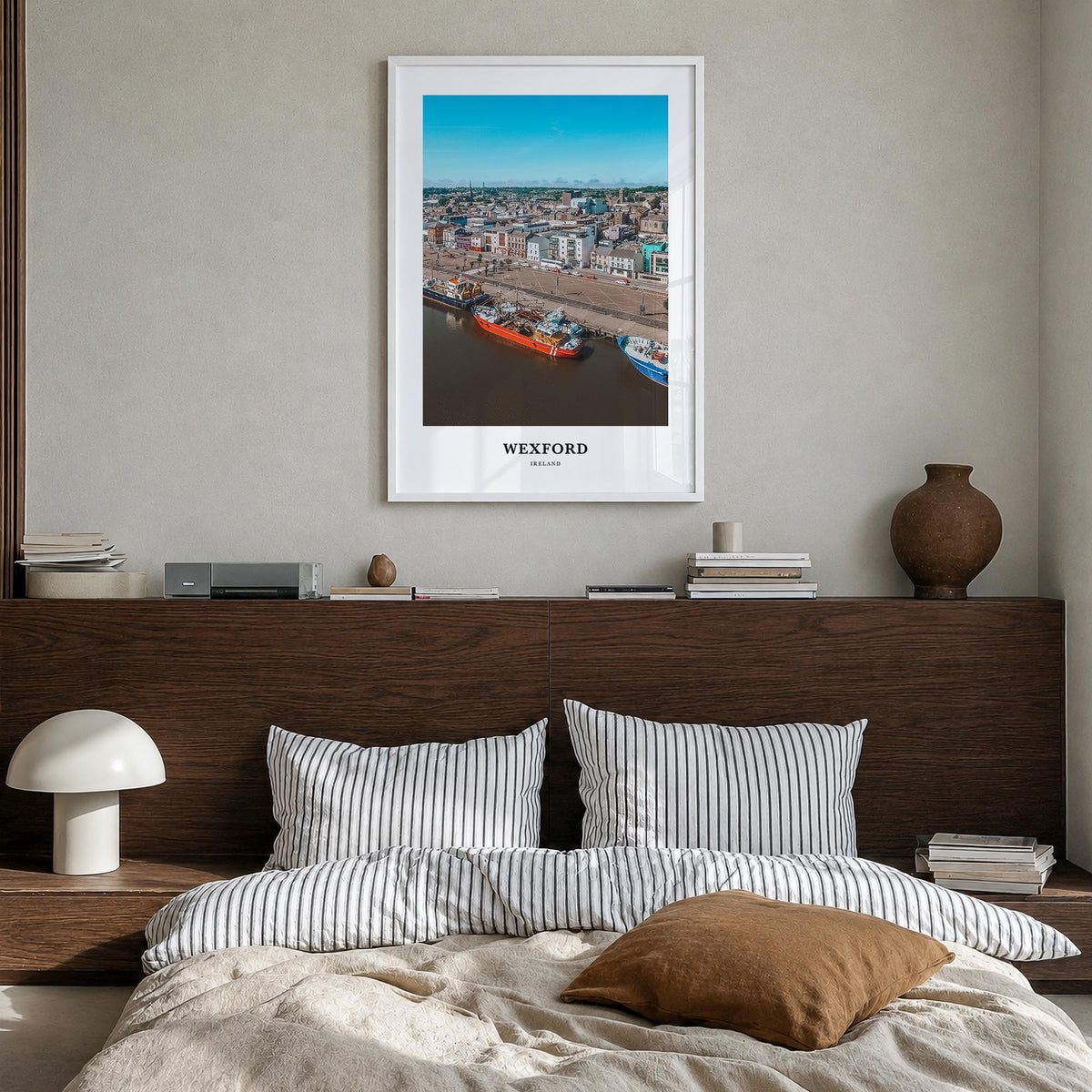Wexford colorful classic poster of Ireland – vertical wall art in white wood frame, hanging on wall