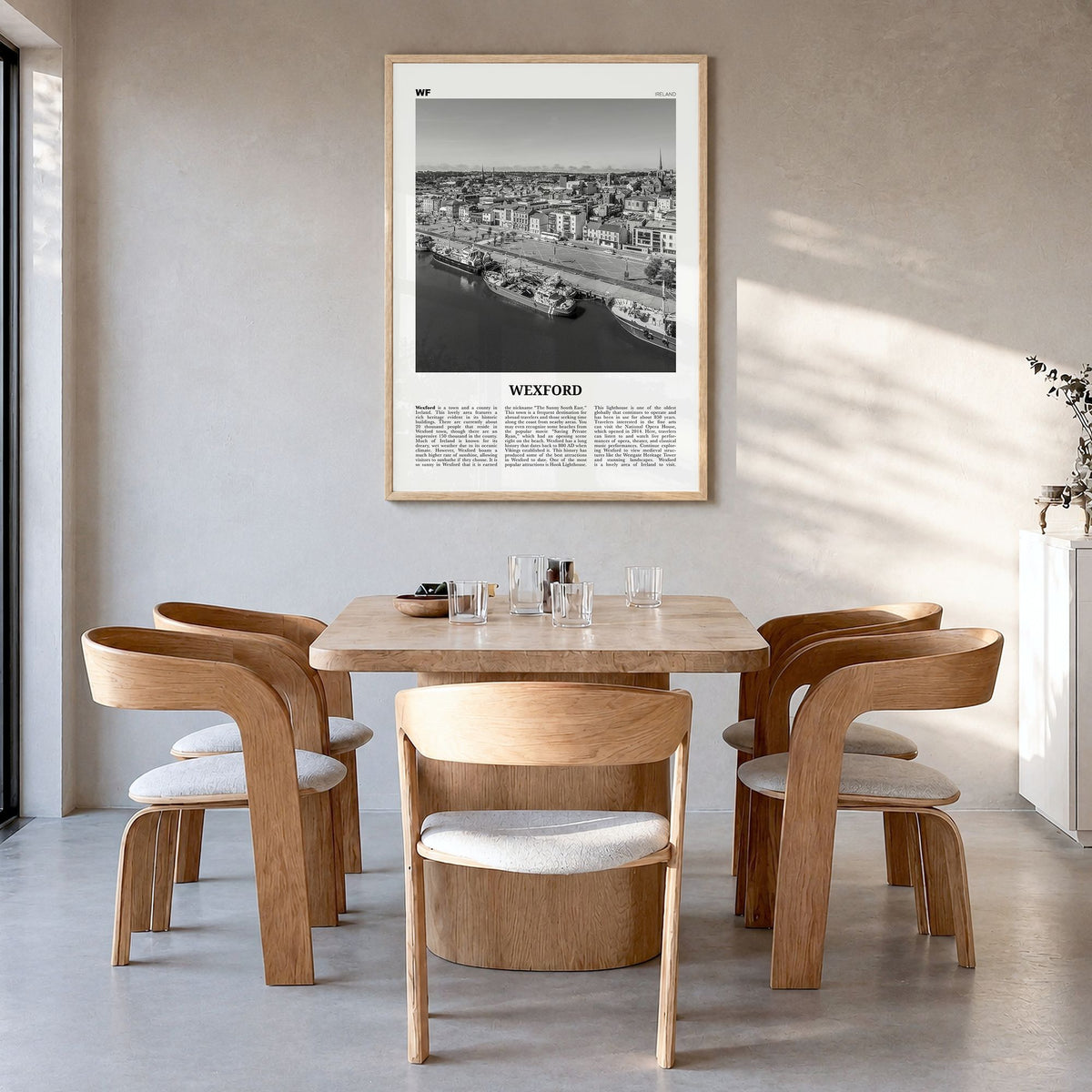 Wexford Newspaper Poster in a natural wood frame, hanging in a dining room
