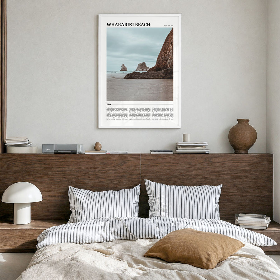 Wharariki Beach Travel Poster in a white wood frame, hanging in a bedroom
