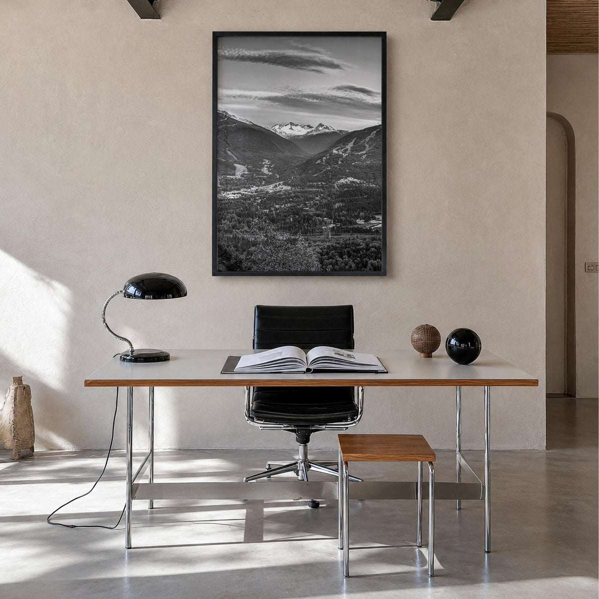 Whistler black & white photo poster of British Columbia, Canada – vertical wall art in black wood frame, hanging on wall