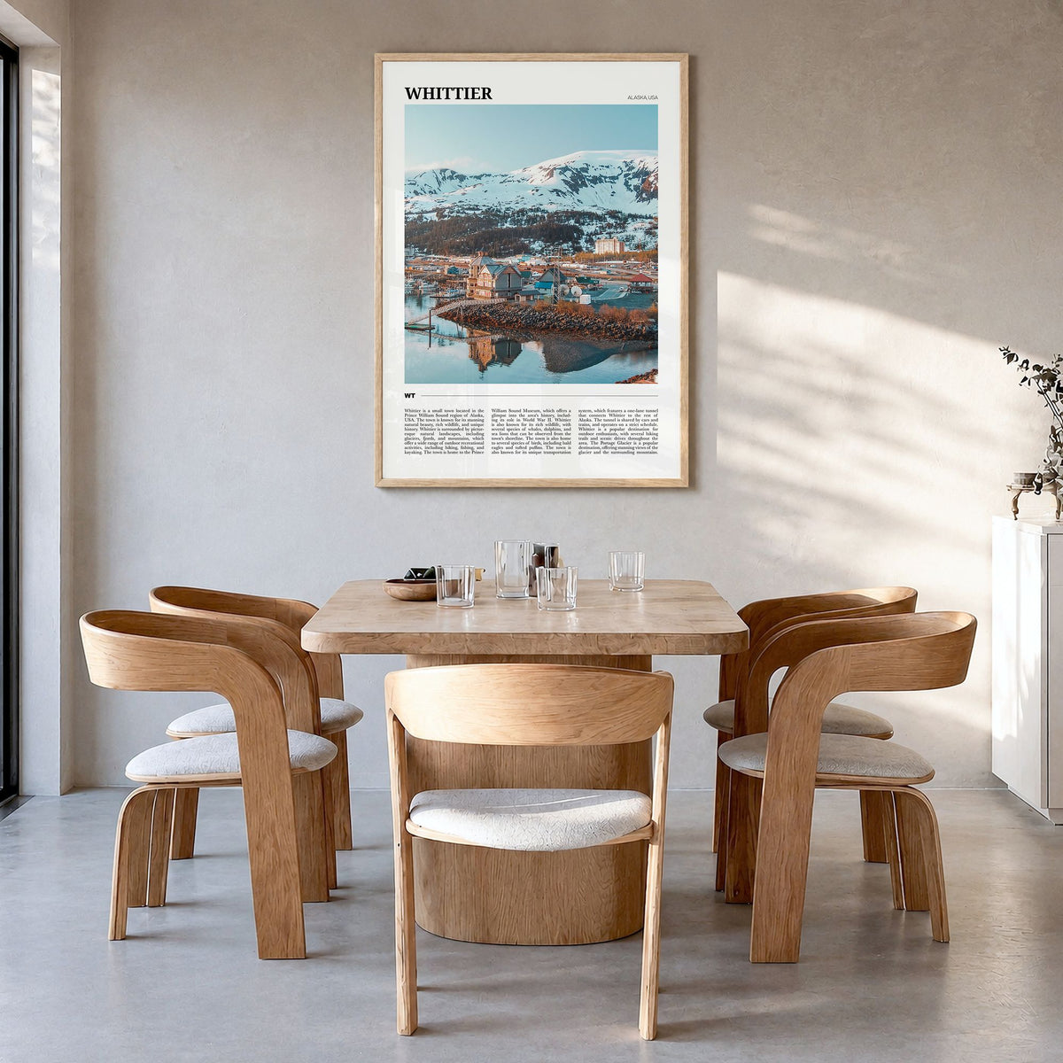 Whittier, Alaska Travel Poster in a natural wood frame, hanging in a dining room