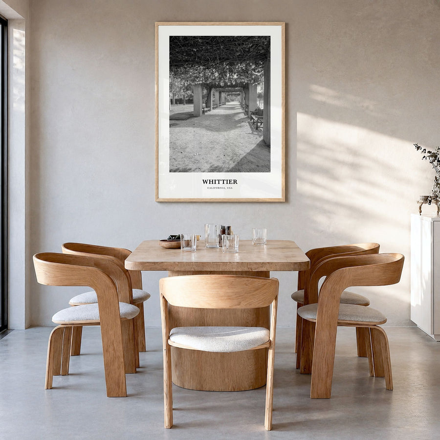 Whittier, California Classic Poster in a natural wood frame, hanging in a dining room