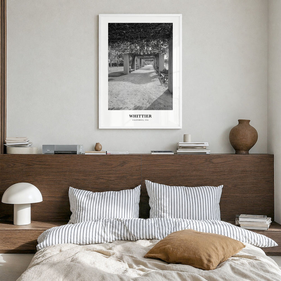 Whittier, California Classic Poster in a white wood frame, hanging in a bedroom