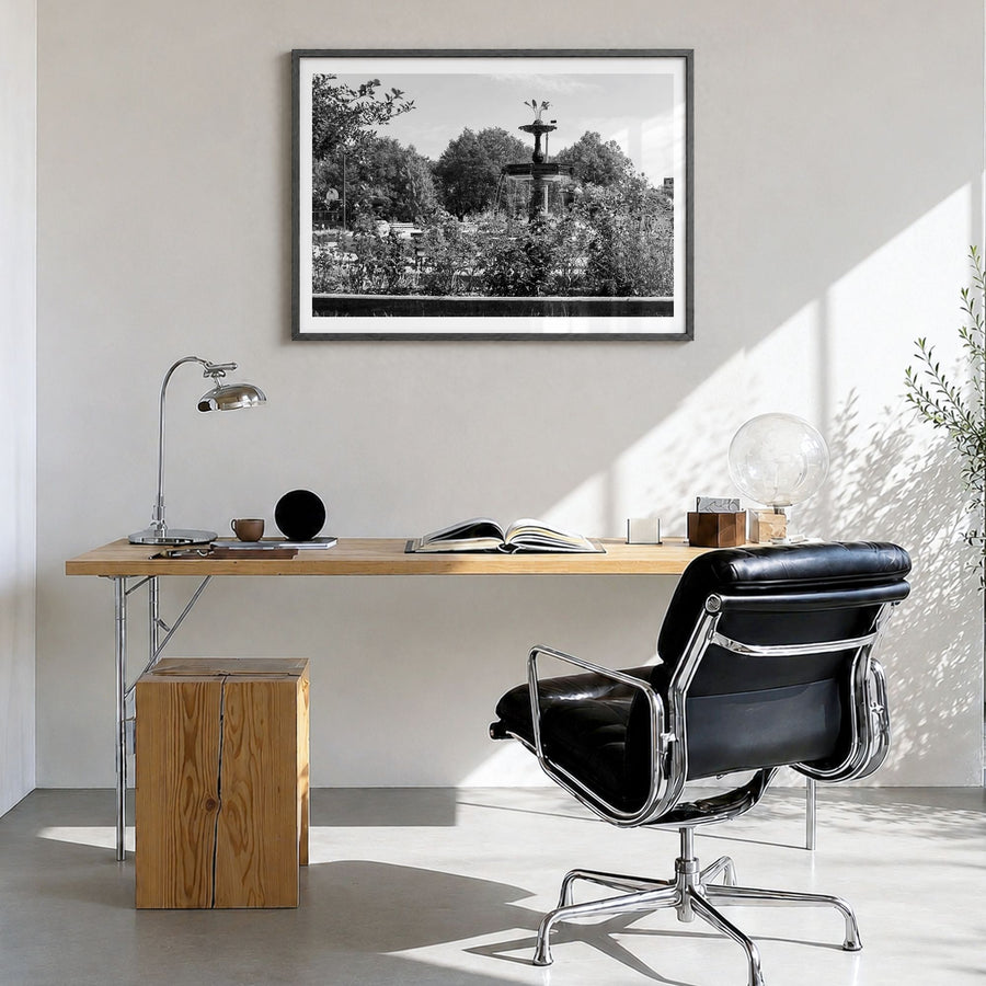 Wicker Park Photo Poster in a black wood frame, hanging in a bright home office, white border