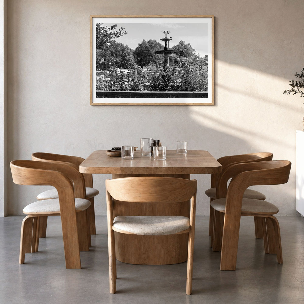 Wicker Park Photo Poster in a natural wood frame, hanging in a dining room, white border