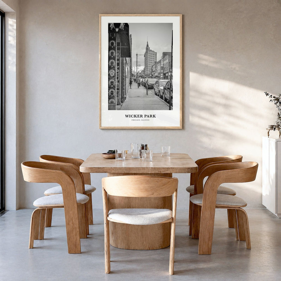 Wicker Park Classic Poster in a natural wood frame, hanging in a dining room