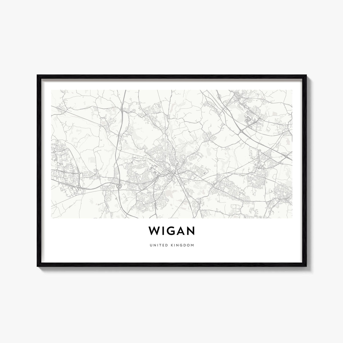 Wigan black & white map poster of England, UK – horizontal wall art, unframed print shown in interior mockup