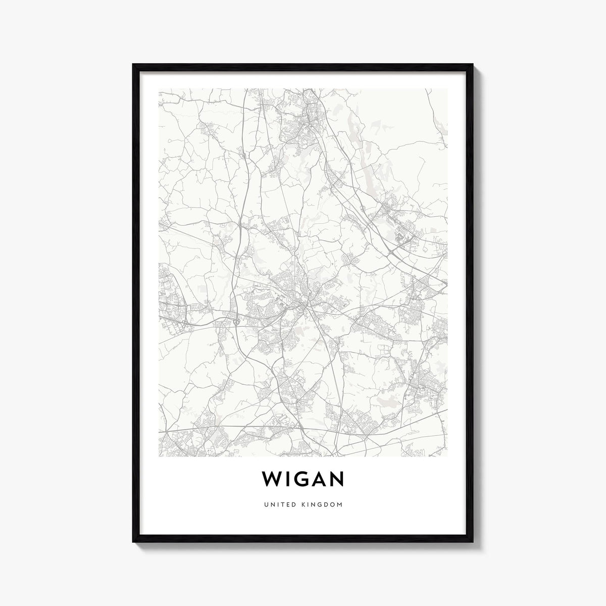 Wigan black & white map poster of England, UK – vertical wall art, unframed print shown in interior mockup
