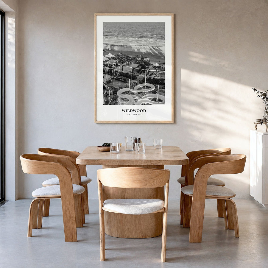 Wildwood Classic Poster in a natural wood frame, hanging in a dining room